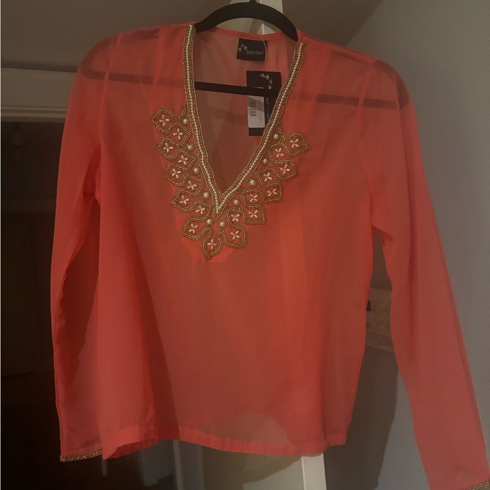 Elegant Coral Blouse with Gold Detailing